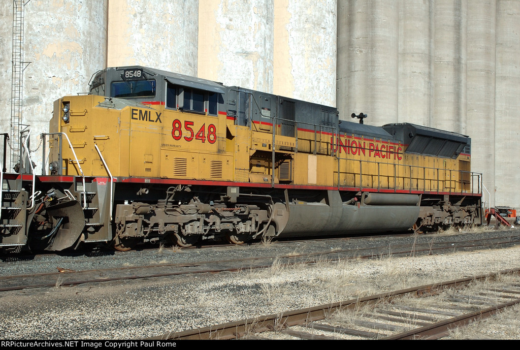 EMLX 8548, EMD SD90MAC-H, in storage on the KCS